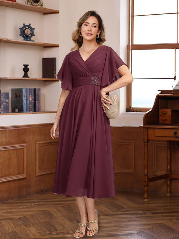 A-Line/Princess V-Neck Ruched Tea-Length Pleated Mother of the Bride & Groom Dresses with Jewel Appliques & Ruffles